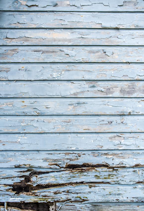 Toile de fond de texture en bois patiné bleu conçu par Beth Hrachovina